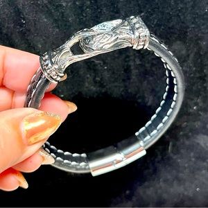 Unisex leatherette cuff style bracelet with slide closure